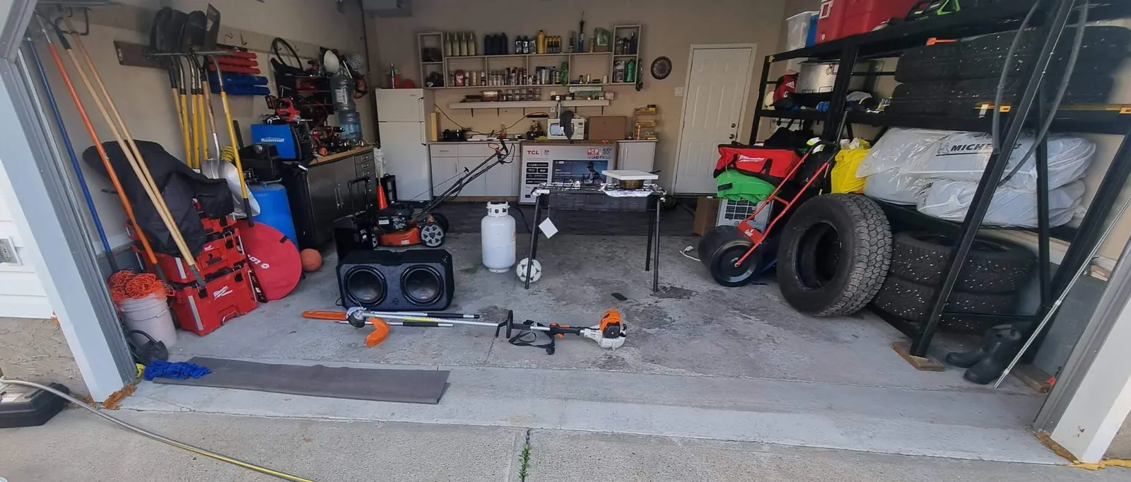 Before Raven flake garage floor renovation